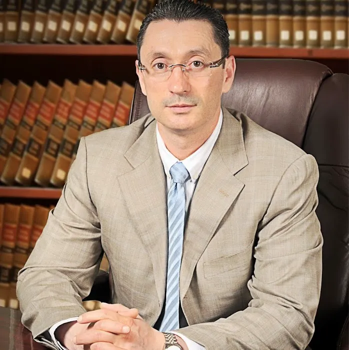 Belushin Law Firm, P.C. 1