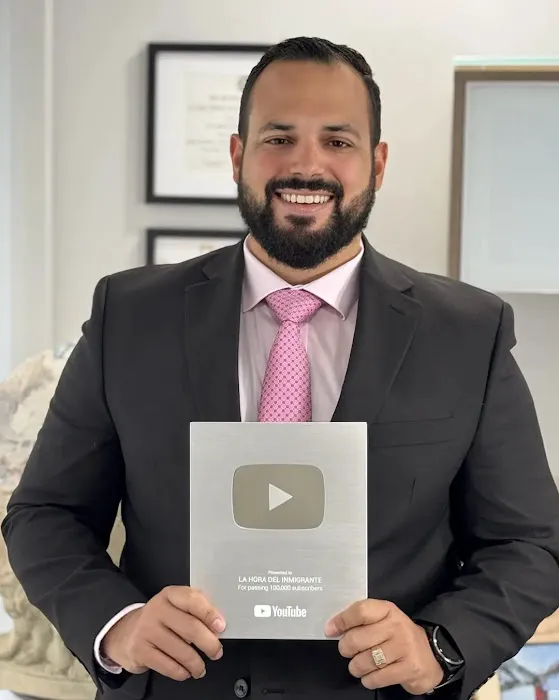 John R. De La Vega, Esq. 0