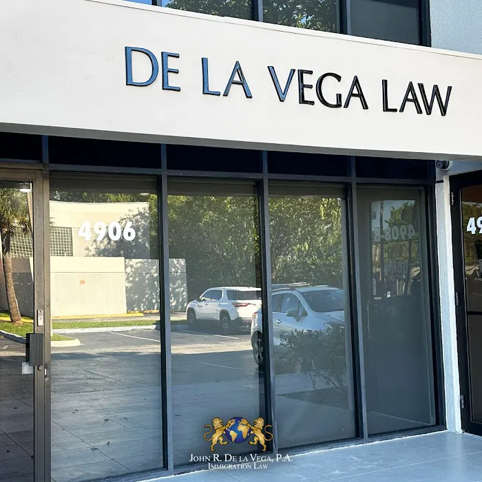 John R. De La Vega, Esq. 2