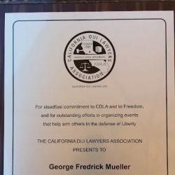 Rick Mueller DUI Attorney ico