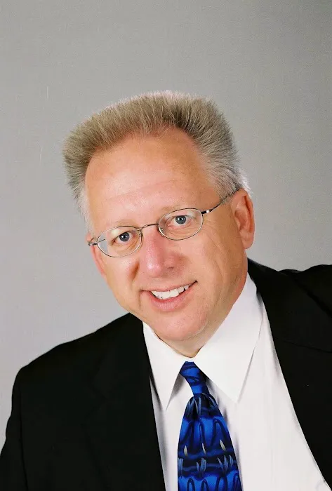 R. Anthony Bauman, APLC 0