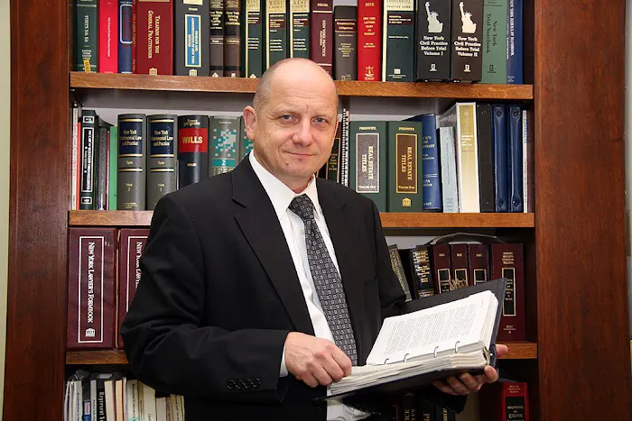 Romuald P. Magda, Esq. 1