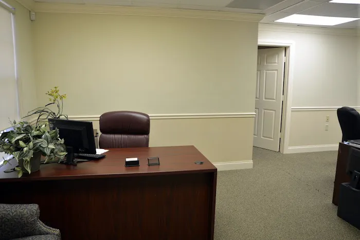 The Law Offices of John E. Mufson 2