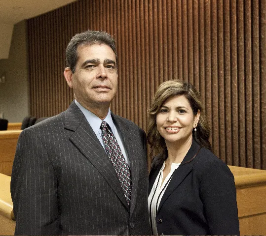 Law Offices of Carlos Martinez and Norkys Perera 1
