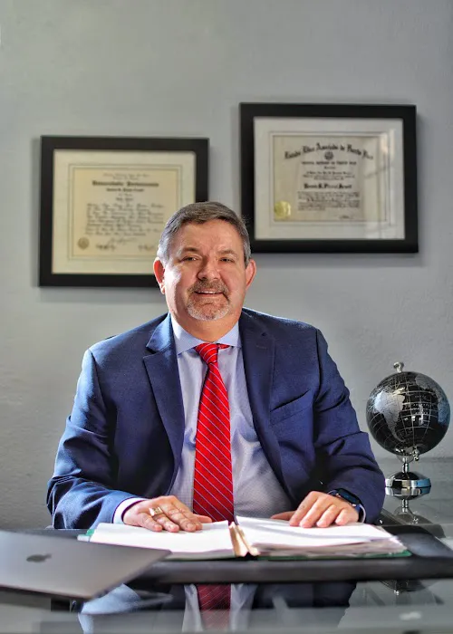 Pizzini - Arnott Immigration Law Firm (Ramon Pizzini) 0