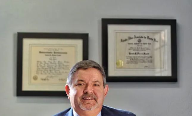 Pizzini - Arnott Immigration Law Firm (Ramon Pizzini)