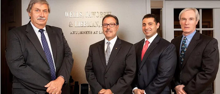 Wells, Jaworksi, & Liebman LLP 4