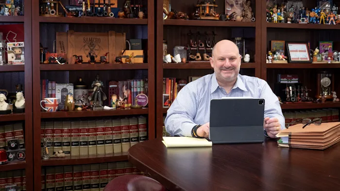 Law Offices of Peter J. Lamont 8