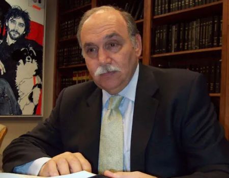 Neal S Comer Esq