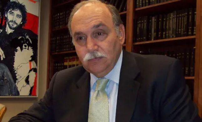 Neal S Comer Esq