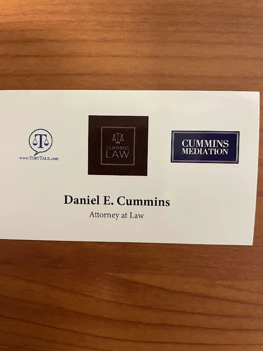 Daniel E. Cummins, Esq. 0