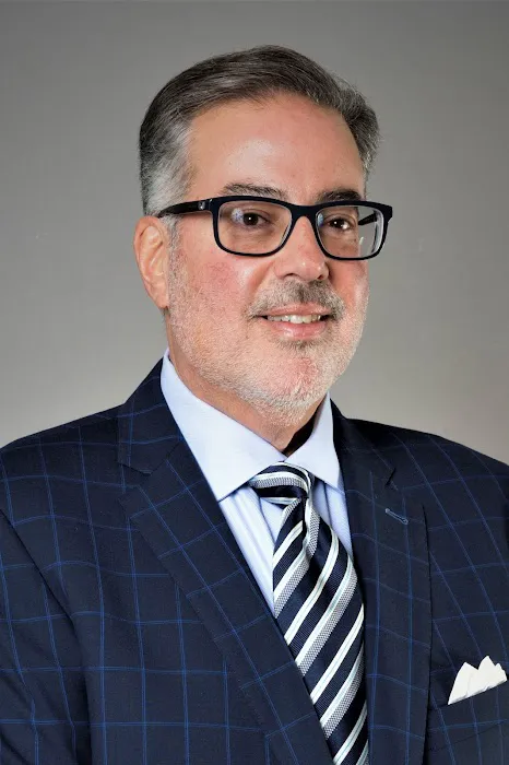 Keith DosSantos, Esq. 0