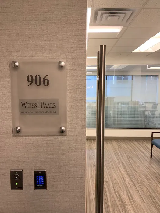 Weiss & Paarz, P.C. 4
