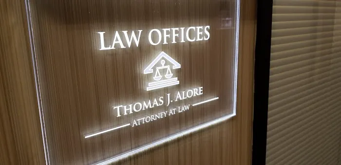 Thomas J. Alore 1