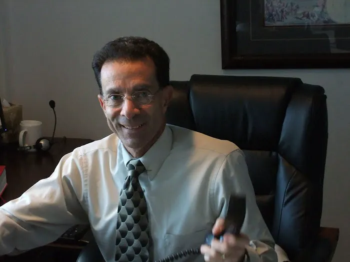 John E. DeVito, Esq. 1